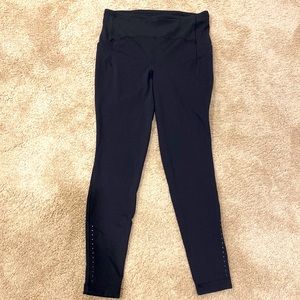 Lululemon black leggings with side pockets - older style - barely worn - size 10